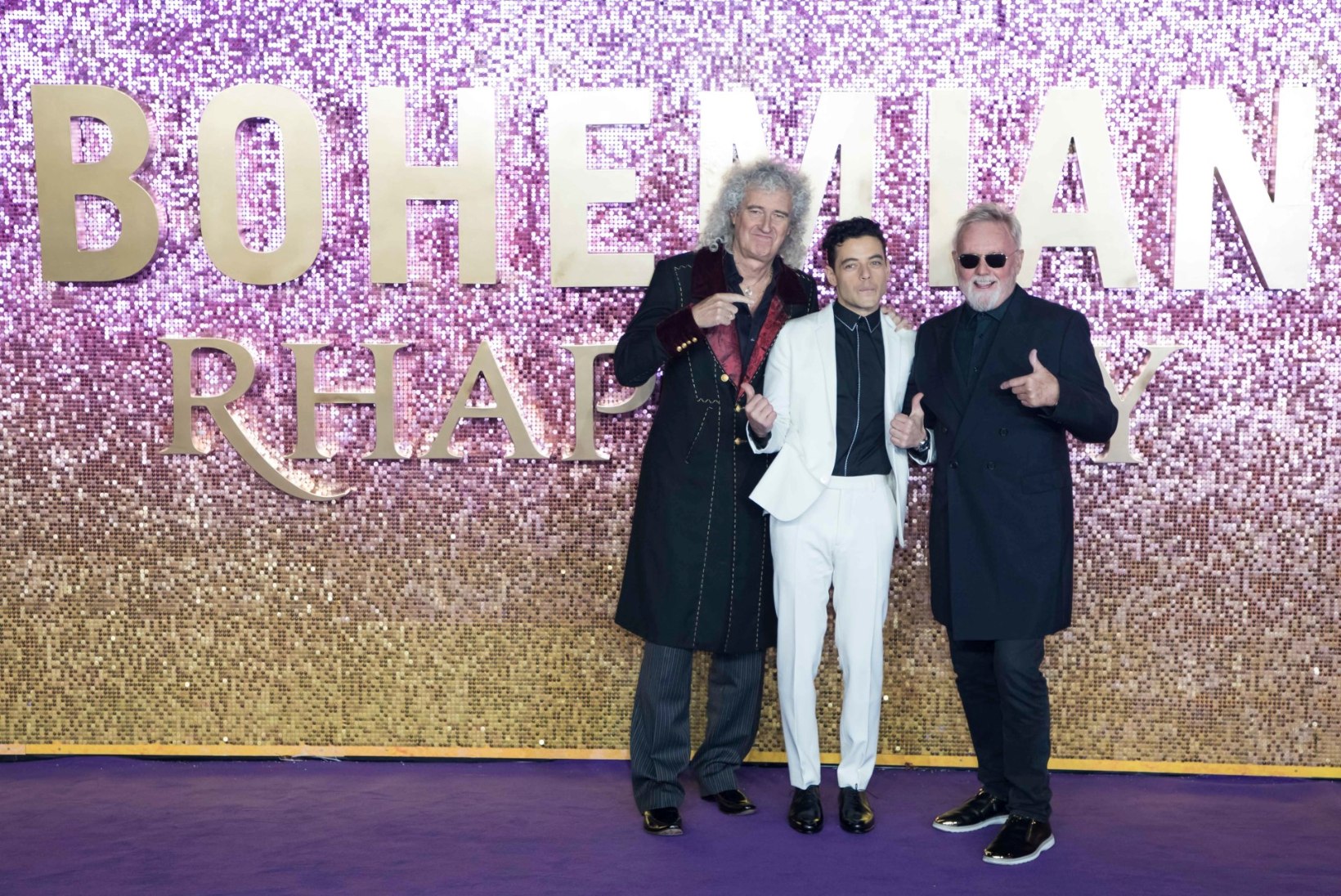 Freddie Mercury bändikaaslased poseerisid Queeni filmi esilinastusel